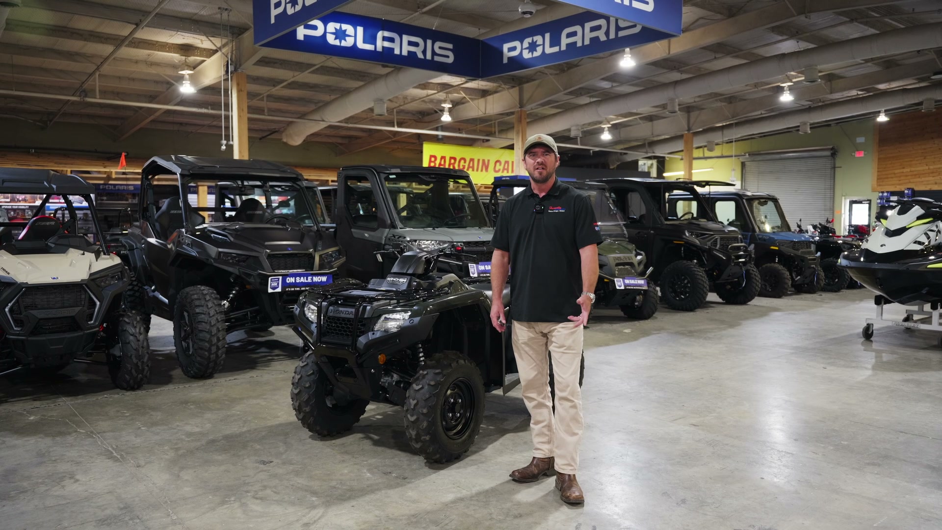 Hunter with a camo ATV in the field — Hunter Bundle from Friendly Powersports Baton Rouge